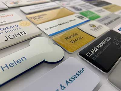 Name Badges Get a Makeover: Custom Sizes, Attachments & Laser Cutting Magic!