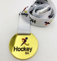 evright.com | Hockey SA laser engrave rear of custom medals